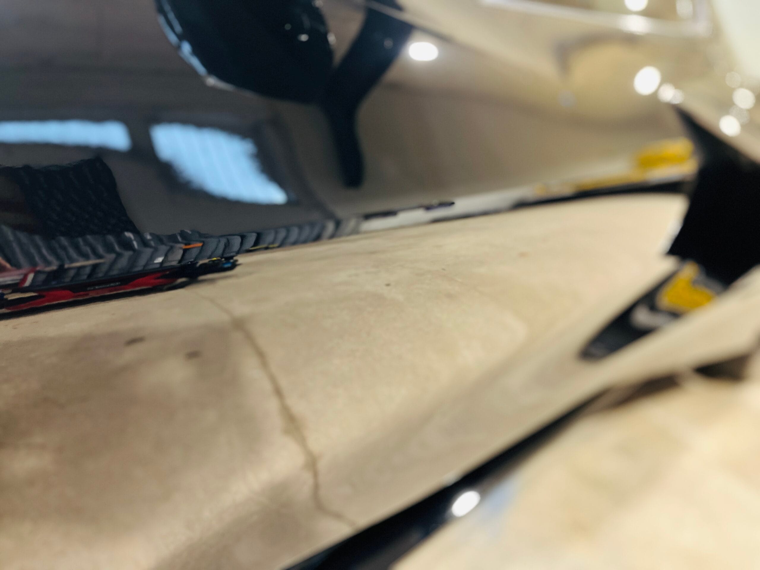 Red paint showing deep gloss and reflections after ceramic coating at SkyShine Auto Detailing