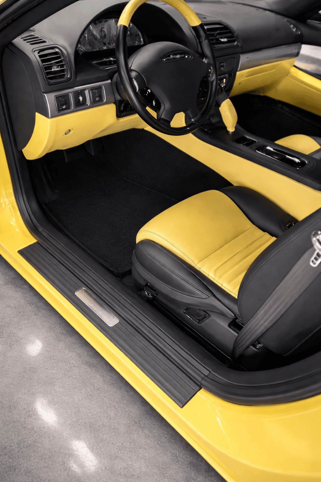 Yellow sports car interior after detailing